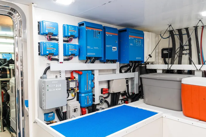 Whitefish Yacht Photos Pics Electrical system in 2013 Ocean Alexander 72 Pilothouse yacht, featuring blue power inverters.
