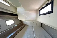 Interior cabin of 2017 Hanse 548 yacht with modern design and natural light.