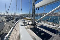 Sailing yacht Hanse 548 (2017) docked at a marina under clear blue skies.
