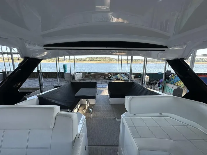  Yacht Photos Pics 2021 Cruisers Yachts 39 Express Coupe interior with lake view.