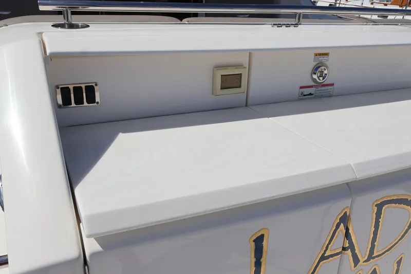 Lady Linn Yacht Photos Pics 2020 Tiara Yachts C44 Coupe stern detail with control panel and railing.