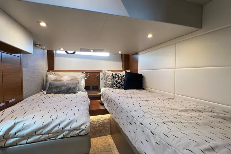 Lady Linn Yacht Photos Pics Interior cabin of 2020 Tiara Yachts C44 Coupe with twin beds and modern decor.