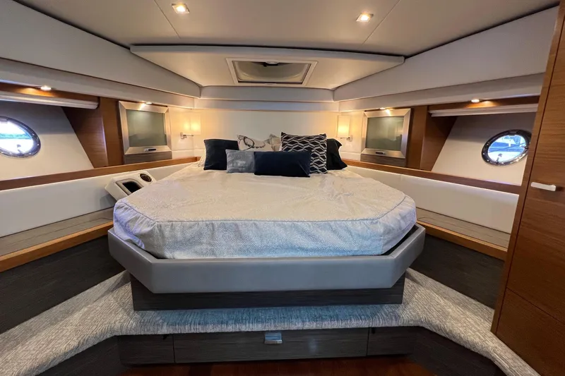 Lady Linn Yacht Photos Pics Luxurious bedroom interior of 2020 Tiara Yachts C44 Coupe with modern design.