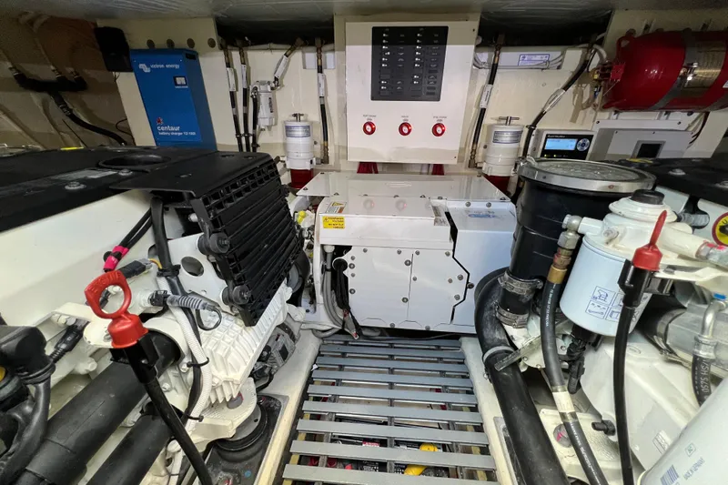 Lady Linn Yacht Photos Pics Engine room of 2020 Tiara Yachts C44 Coupe, showcasing mechanical components and systems.