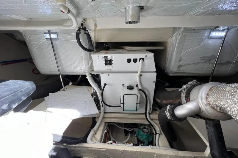 Lady Linn Yacht Photos Pics Engine room of 2020 Tiara Yachts C44 Coupe, showcasing mechanical components and insulation.