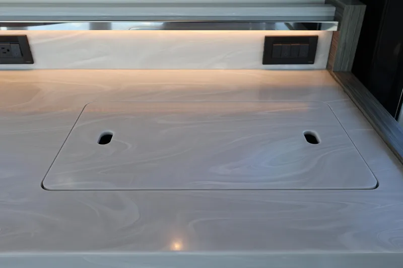 Lady Linn Yacht Photos Pics Modern kitchen countertop on 2020 Tiara Yachts C44 Coupe with integrated outlets.