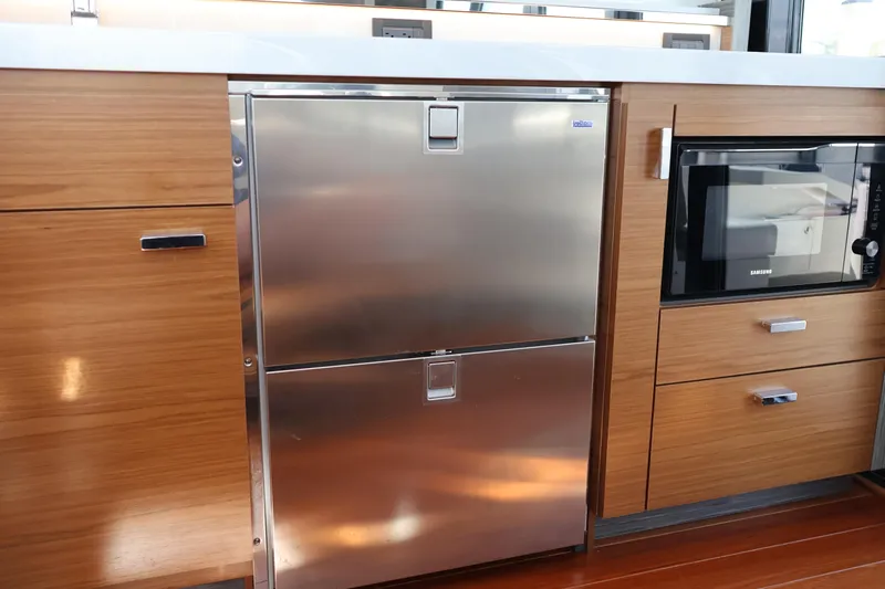 Lady Linn Yacht Photos Pics Modern kitchen area in 2020 Tiara Yachts C44 Coupe with stainless steel appliances.
