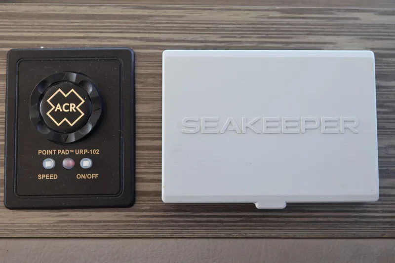 Lady Linn Yacht Photos Pics Control panel and Seakeeper unit on 2020 Tiara Yachts C44 Coupe.