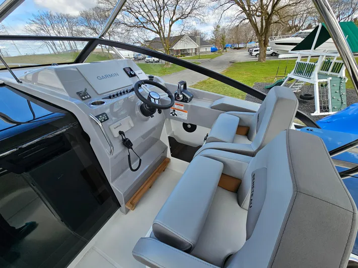  Yacht Photos Pics 2024 Beneteau Flyer 10 cockpit with modern steering and dual seating.