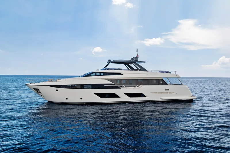 Our Trade Yacht Photos Pics Luxury 2021 Ferretti Yachts 920 cruising on open sea under clear sky.