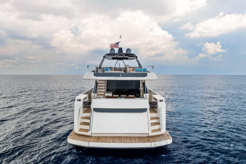Our Trade Yacht Photos Pics Ferretti Yachts 920, 2021 model, cruising on open sea under cloudy sky.