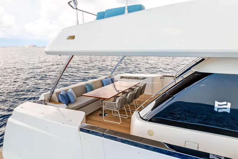 Our Trade Yacht Photos Pics Luxurious 2021 Ferretti Yachts 920 with elegant outdoor seating on the deck.