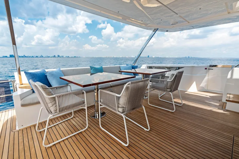 Our Trade Yacht Photos Pics Luxurious 2021 Ferretti Yachts 920 deck with elegant seating and ocean view.