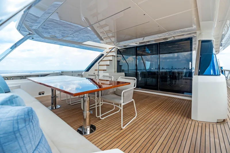 Our Trade Yacht Photos Pics Luxurious 2021 Ferretti Yachts 920 deck with elegant seating and wooden flooring.
