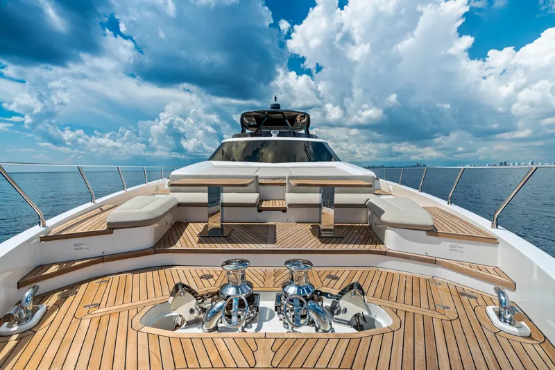 Our Trade Yacht Photos Pics Luxurious 2021 Ferretti Yachts 920 with spacious deck and elegant seating under a vibrant sky.