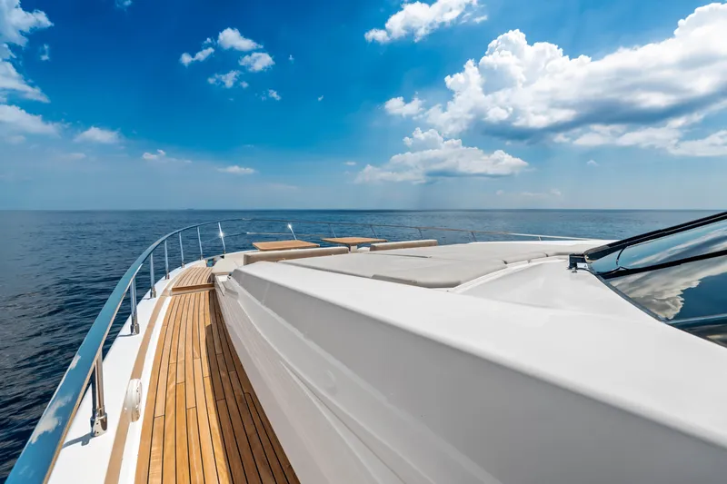 Our Trade Yacht Photos Pics Luxurious 2021 Ferretti Yachts 920 on open sea under clear blue sky.