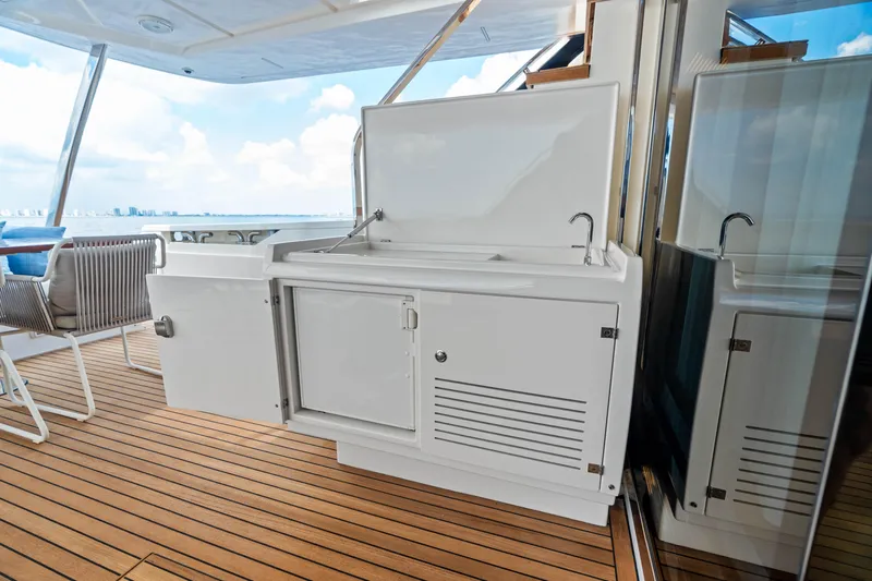 Our Trade Yacht Photos Pics Outdoor kitchenette on 2021 Ferretti Yachts 920, featuring sleek design and ocean view.