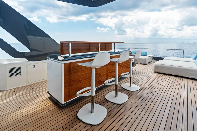 Our Trade Yacht Photos Pics Luxurious deck of 2021 Ferretti Yachts 920 with bar and ocean view.