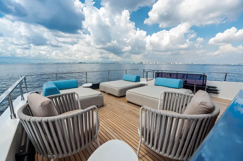 Our Trade Yacht Photos Pics Luxurious deck of 2021 Ferretti Yachts 920 with stylish seating and ocean view.