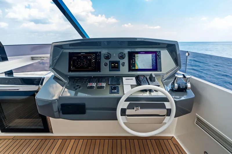 Our Trade Yacht Photos Pics Helm of 2021 Ferretti Yachts 920 with advanced navigation systems and ocean view.