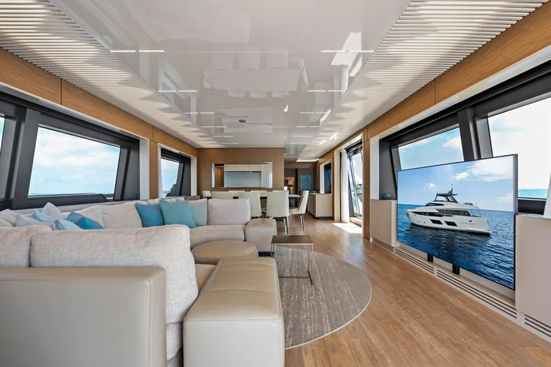 Our Trade Yacht Photos Pics Luxurious interior of 2021 Ferretti Yachts 920 with modern decor and large windows.