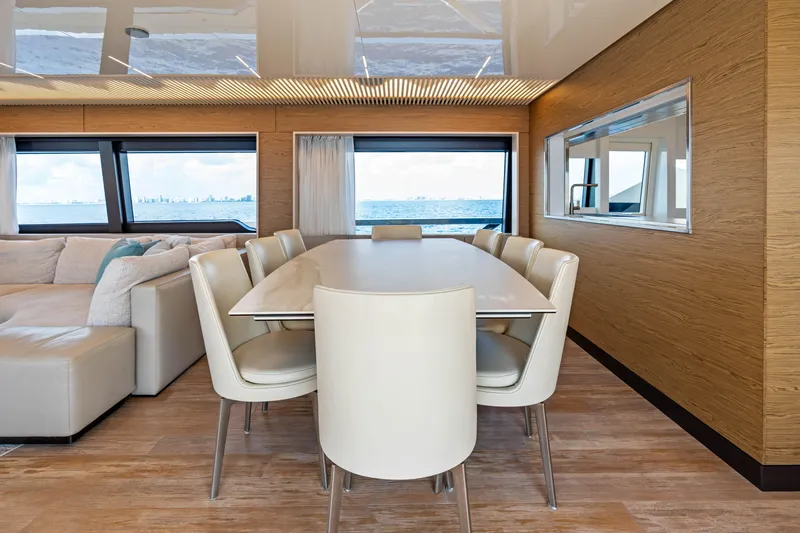Our Trade Yacht Photos Pics Luxurious dining area on 2021 Ferretti Yachts 920 with ocean view.
