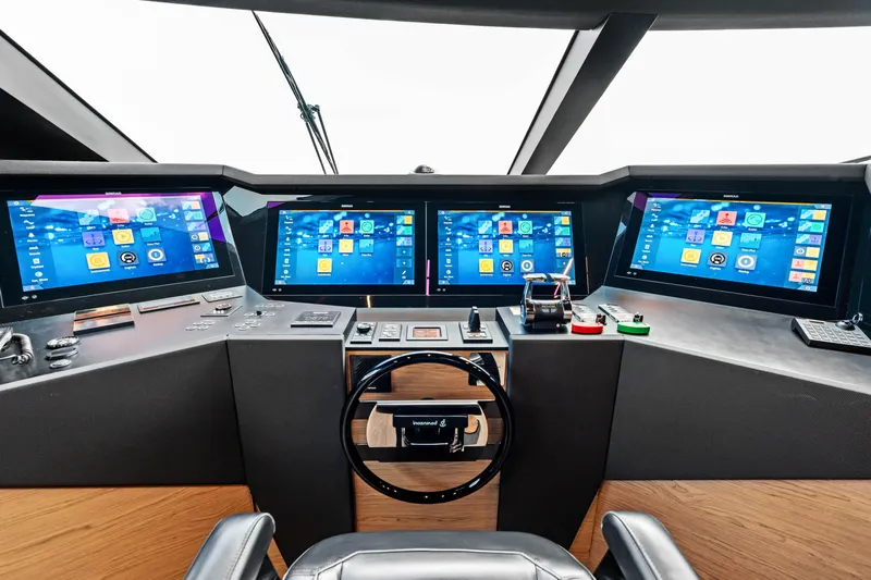 Our Trade Yacht Photos Pics Helm of 2021 Ferretti Yachts 920 with advanced navigation displays and controls.