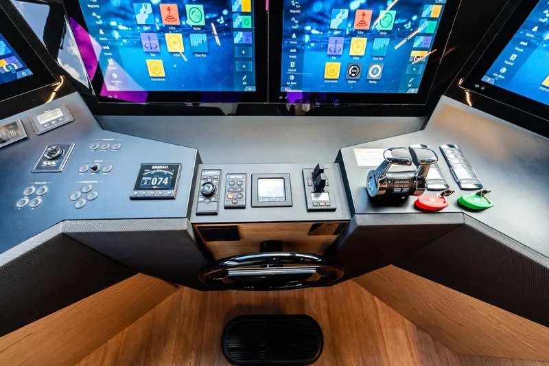 Our Trade Yacht Photos Pics Helm station of 2021 Ferretti Yachts 920 with advanced navigation controls and displays.