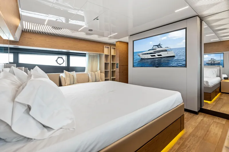 Our Trade Yacht Photos Pics Luxurious bedroom interior of 2021 Ferretti Yachts 920 with modern design and yacht view.