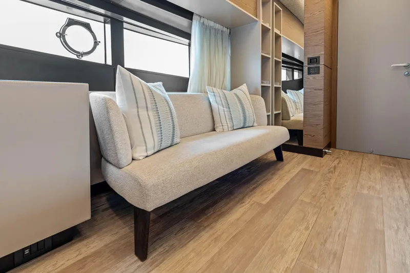 Our Trade Yacht Photos Pics Luxurious interior of 2021 Ferretti Yachts 920 with elegant seating and modern decor.