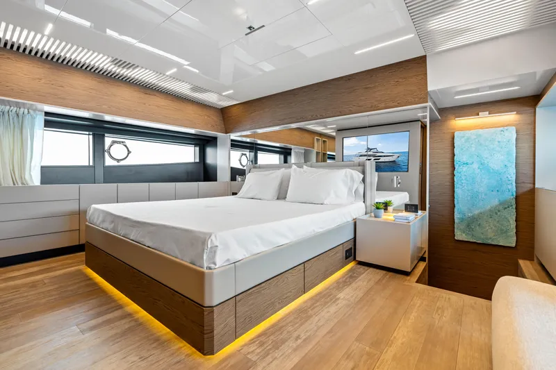 Our Trade Yacht Photos Pics Luxurious bedroom interior of 2021 Ferretti Yachts 920 with modern design and ambient lighting.