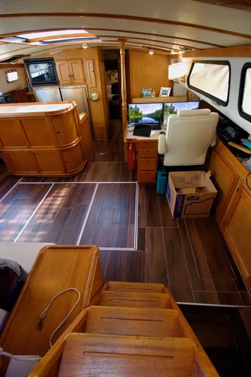 Sarita Sea Yacht Photos Pics Interior of 1983 Lancer Yachts Motorsailer with wooden finishes and modern amenities.