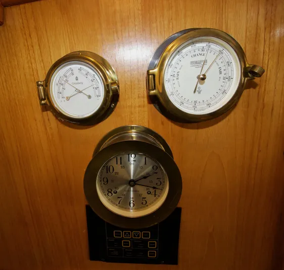 Sarita Sea Yacht Photos Pics Brass instruments on 1983 Lancer Yachts Motorsailer: clock, barometer, and hygrometer.