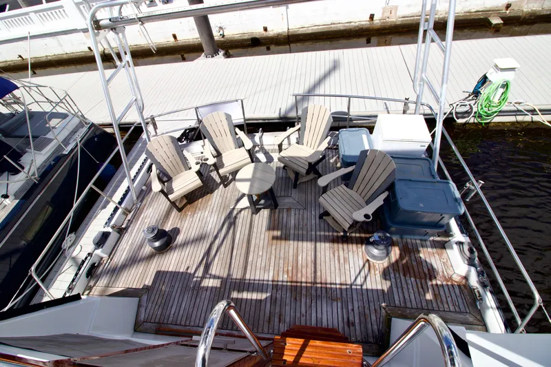 Sarita Sea Yacht Photos Pics Spacious deck of 1983 Lancer Yachts Motorsailer with seating and table.