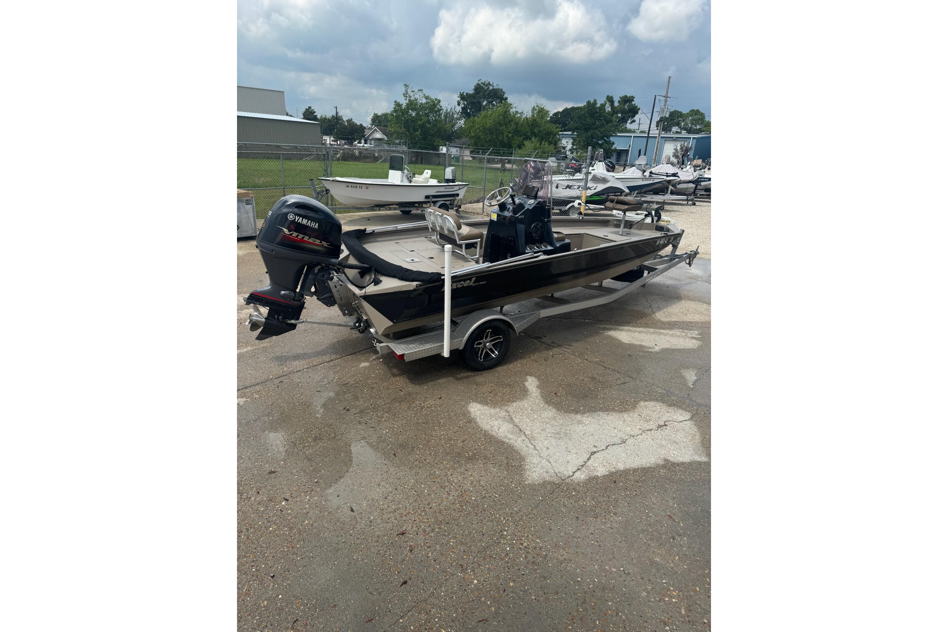 2020 Excel 203 Bay Pro boat with Yamaha outboard motor on trailer.