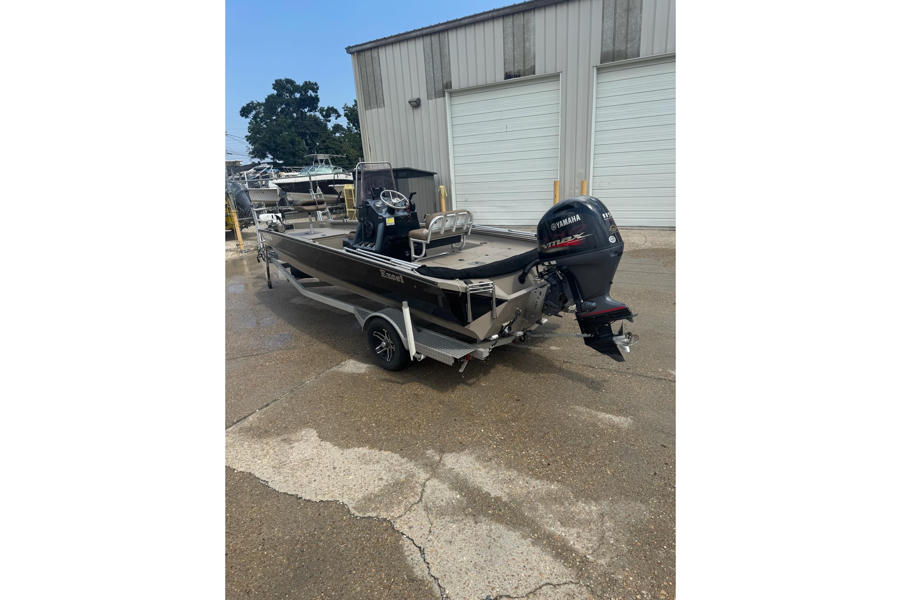 2020 Excel 203 Bay Pro boat with Yamaha outboard motor on trailer.