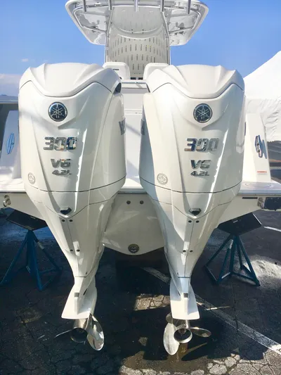  Yacht Photos Pics 2024 Contender 32 ST with twin 300 V6 outboard engines, rear view.