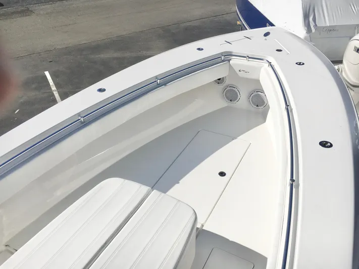  Yacht Photos Pics 2024 Contender 32 ST boat deck with seating and speakers.