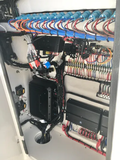  Yacht Photos Pics 2024 Contender 32 ST electrical wiring system with organized cables and components.