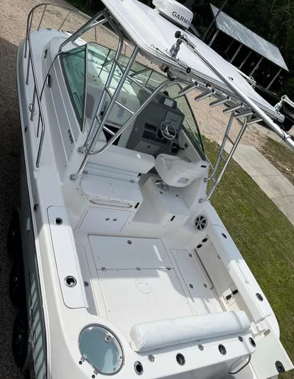  Yacht Photos Pics 2015 Robalo R305 Walkaround boat with spacious deck and modern controls.