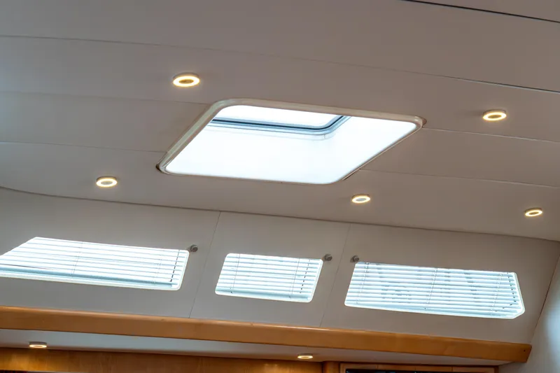 Django Too Yacht Photos Pics Ceiling view of 1991 Trehard SLOOP 83 yacht with skylight and recessed lighting.