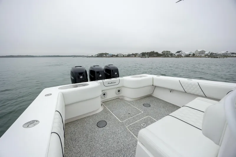 Hoo Hunter Yacht Photos Pics 2012 SeaHunter 37 Tournament boat with triple engines on calm water.