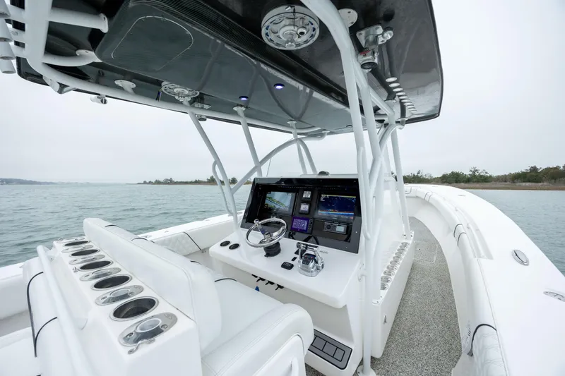 Hoo Hunter Yacht Photos Pics 2012 SeaHunter 37 Tournament boat cockpit with advanced navigation systems on open water.