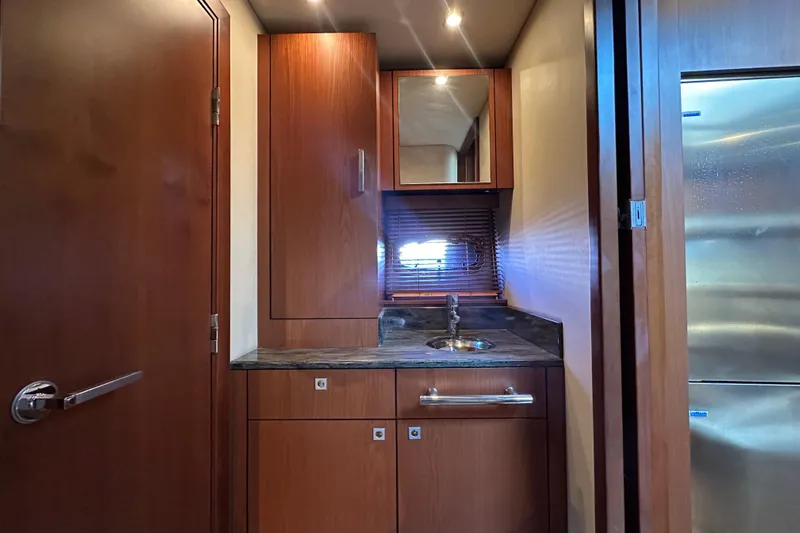 Life's Grande Yacht Photos Pics Luxurious wooden interior of 2012 Sea Ray 470 Sundancer yacht bathroom.