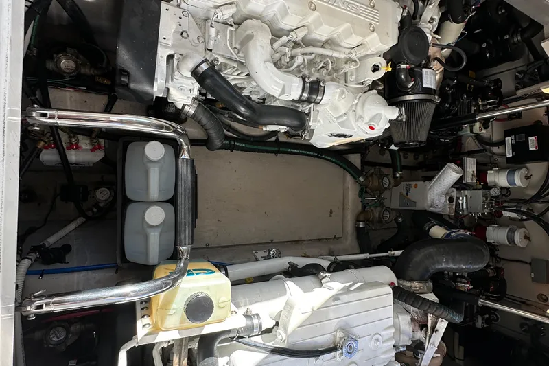 Life's Grande Yacht Photos Pics Engine room of 2012 Sea Ray 470 Sundancer, showcasing mechanical components and systems.