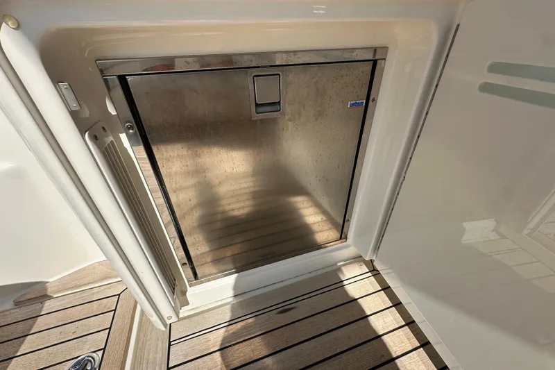 Life's Grande Yacht Photos Pics Stainless steel refrigerator on 2012 Sea Ray 470 Sundancer yacht deck.