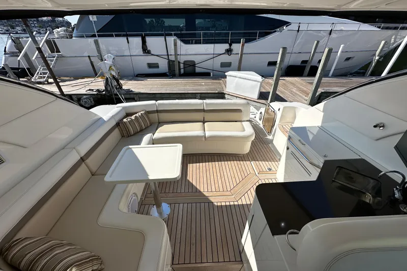 Life's Grande Yacht Photos Pics Luxurious 2012 Sea Ray 470 Sundancer yacht interior with elegant seating and modern amenities.