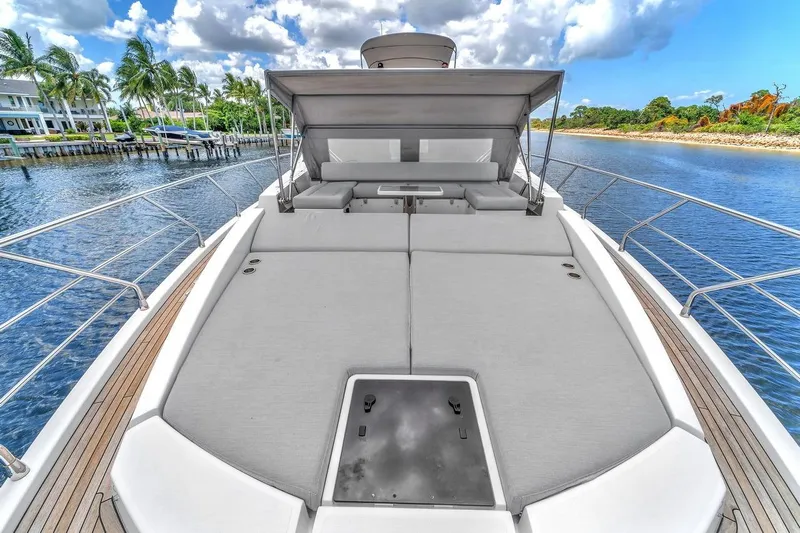 Evexias Yacht Photos Pics Luxurious 2020 Azimut S7 FLY yacht with spacious sun deck and scenic waterfront view.