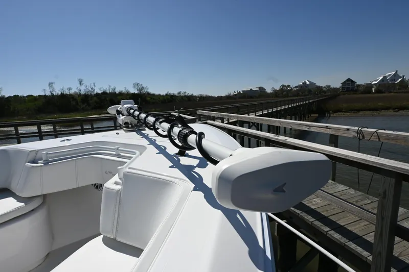  Yacht Photos Pics 2023 Contender 32ST boat docked, showcasing sleek design and advanced features.