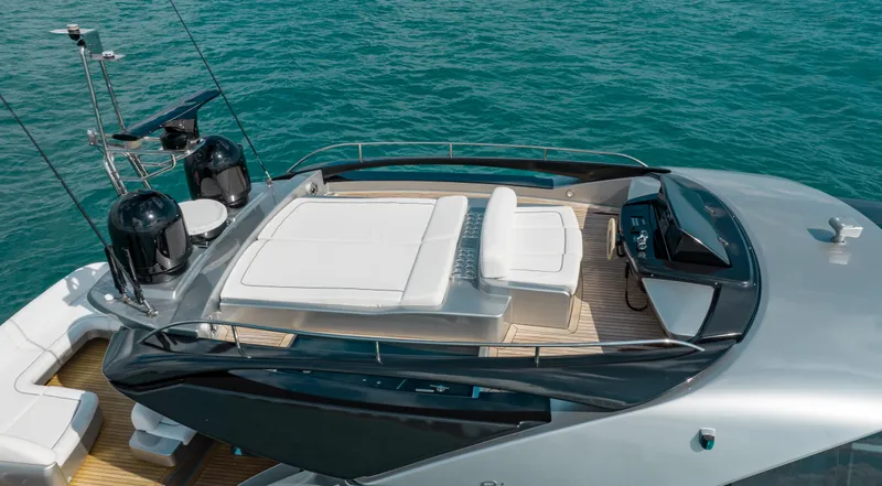 Purosangue Yacht Photos Pics Luxurious 2014 Riva 86' DOMINO yacht on serene blue waters.